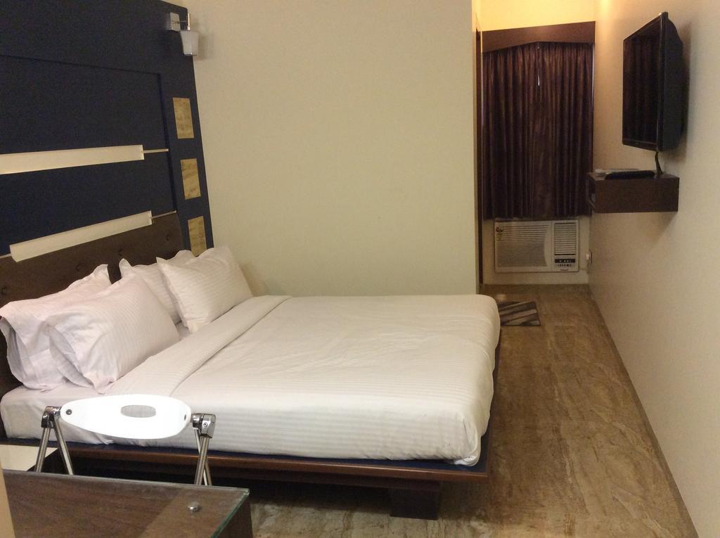 Hotel Sapna Мумбаи Номер фото